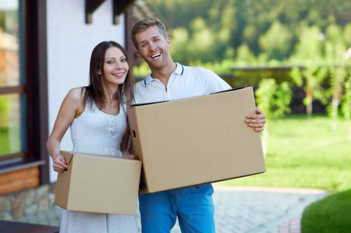 Careful wrapping and labelling of household items during packing services in Becontreeheath