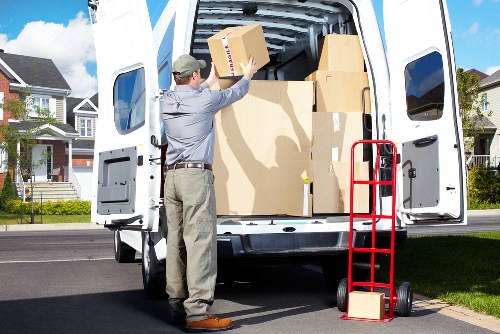 Packed boxes and furniture ready for a local house removal