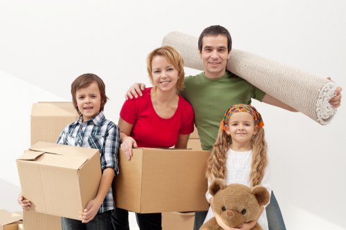 Careful loading of household furniture into a moving van