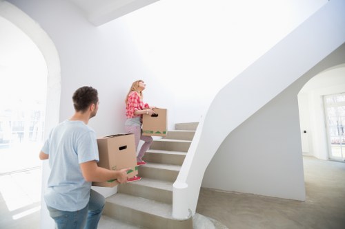 Trained staff handling furniture carefully in a Becontreeheath move